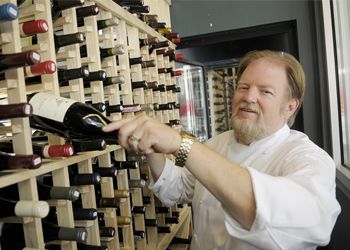 Bill King, executive chef/owner of Pinot American Brasserie in downtown Portland, has created an impressive Oregon Pinot Noir list.  Photo by Rick Schafer.