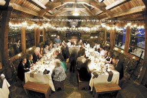 Guests in the main room savor the multi-course dinner.  Photo by DS Imagery.