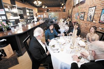 Period-attired Jerry and Susan Murphy enjoy the oysters Rockefeller at Latitude one’s titanic 100th anniversary dinner in Dallas, OR Period-attired Jerry and Susan Murphy enjoy the oysters Rockefeller at Latitude one’s titanic 100th anniversary dinner in Dallas, OR