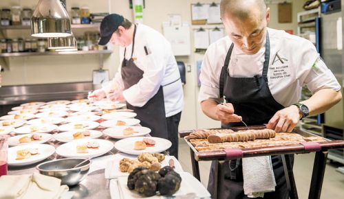 Executive Chef Sunny Jin prepares one of many truffled courses during the dinner at The Allison. Both black and white truffles were featured. ##Photo by John Valls.