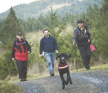 Tucker, a Standard Poodle, is directed by certified K-9 trainers Deborah and David
Walker. Dr. Charles Lefevre takes them to the truffle patch near Lorane.