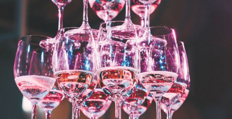 A tower of glasses filled with sparkling wine. ## Photo by Lauren D