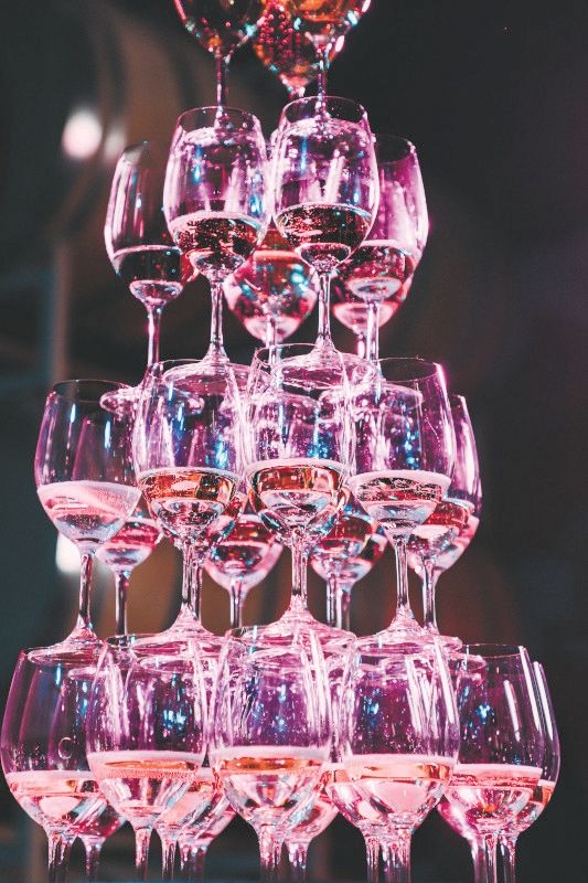 A tower of glasses filled with sparkling wine. ## Photo by Lauren D