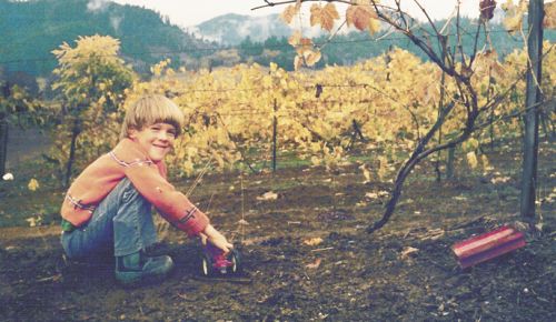 Marc Girardet as a child in the young vineyard. ##Photo provided