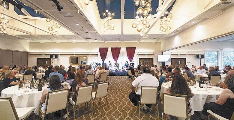 The Oregon Wine Experience panel of judges addresses guests at the 2018 celebration. ##Photo provided.