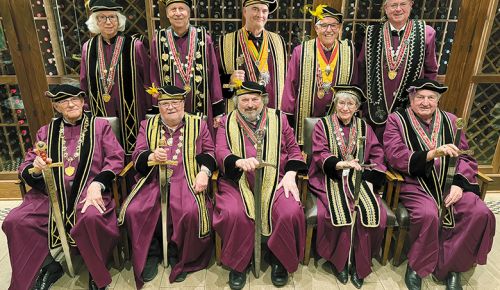 A photo of The Oregon Wine Brotherhood members, taken in the cellar at Portland s Arlington Club on May 29, 2025.  Back row, from left:  Hallie Hackenberger, Sam Kress, Craig Heath, Ken Wightman and Josh Bratt. Front row, from left: Ron Hayes,Paul DeBoni, Paul Hart, Diane Diamond and Tom Hageman. ## Photo provided by The Oregon Wine Brotherhood