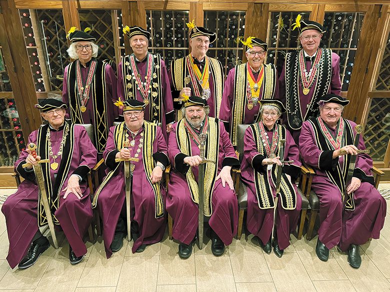 A photo of The Oregon Wine Brotherhood members, taken in the cellar at Portland s Arlington Club on May 29, 2025.  Back row, from left:  Hallie Hackenberger, Sam Kress, Craig Heath, Ken Wightman and Josh Bratt. Front row, from left: Ron Hayes,Paul DeBoni, Paul Hart, Diane Diamond and Tom Hageman. ## Photo provided by The Oregon Wine Brotherhood
