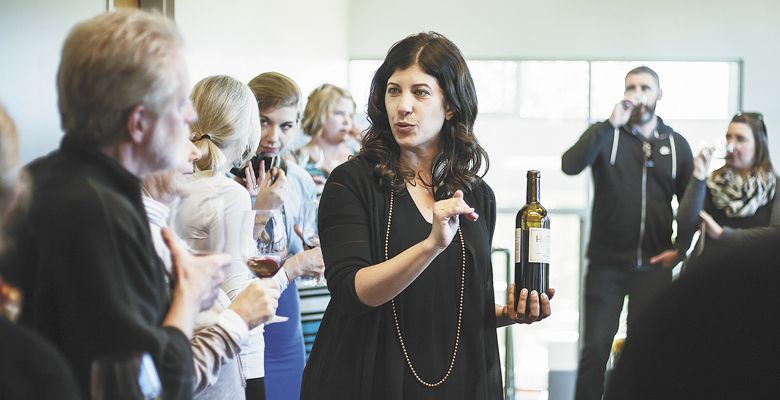 Stoller Family Estate winemaker Melissa Burr pours one of four “History” bottlings at a tasting on the Dundee Hills estate. ##Photo by Austin Raz