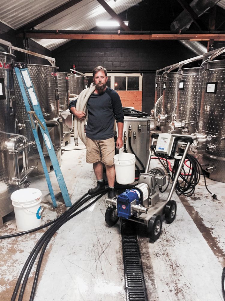 Herb Quady working in the first Barrel 42 winery facility, located in Medford at 42 W. Stewart Ave. Taken in 2015 when Quady was 40 years old, it was originally a pear packing plant.##Photo provided by Quady North