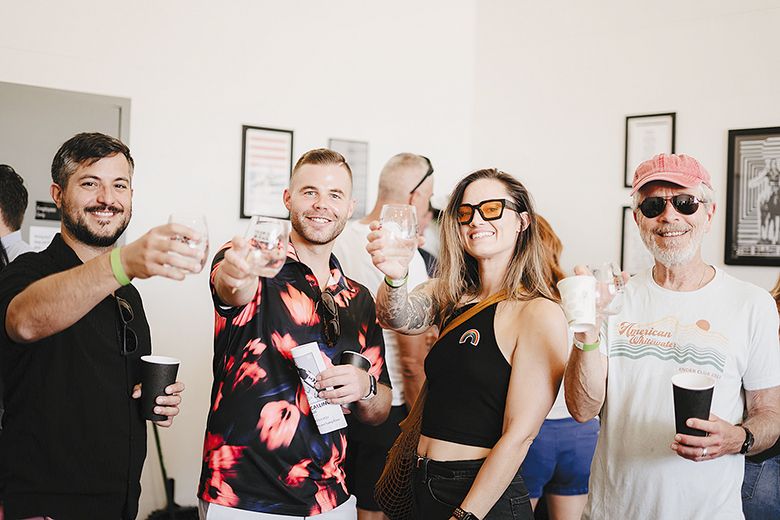 Event attendees enjoying wine samples. ## Photo by Hannah Corella Event attendees enjoying wine samples. ## Photo by Hannah Corella