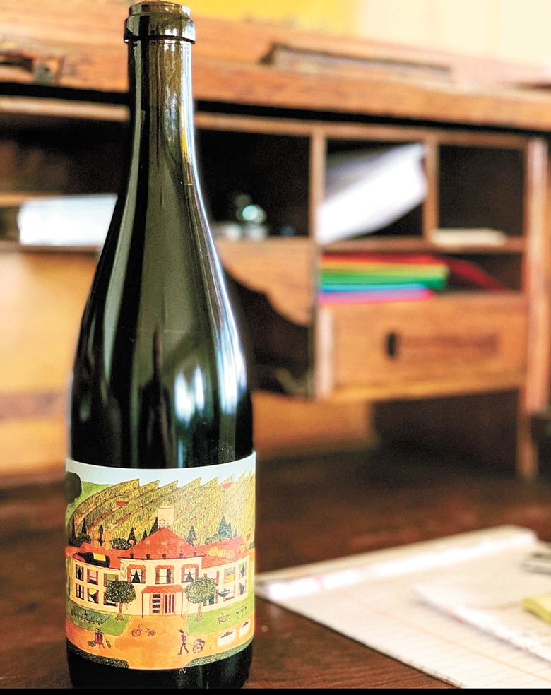 Bottle of Human Cellars Gamay with a label created by Emily.##Photo provided by Human Cellars