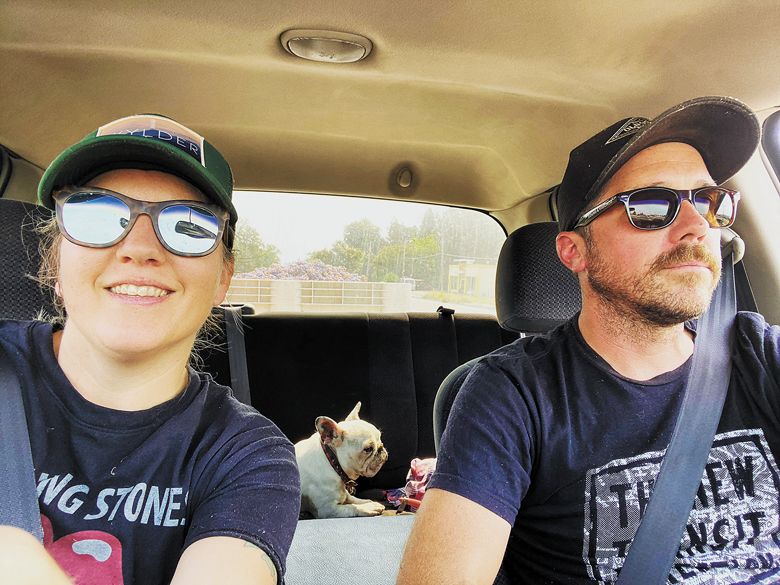 Sound & Vision Wine Co. founders Carmen Nydegger and Joe Chepolis, with dog Arlo in the back seat.##Photo provided by Sound & Vision Wine Co.