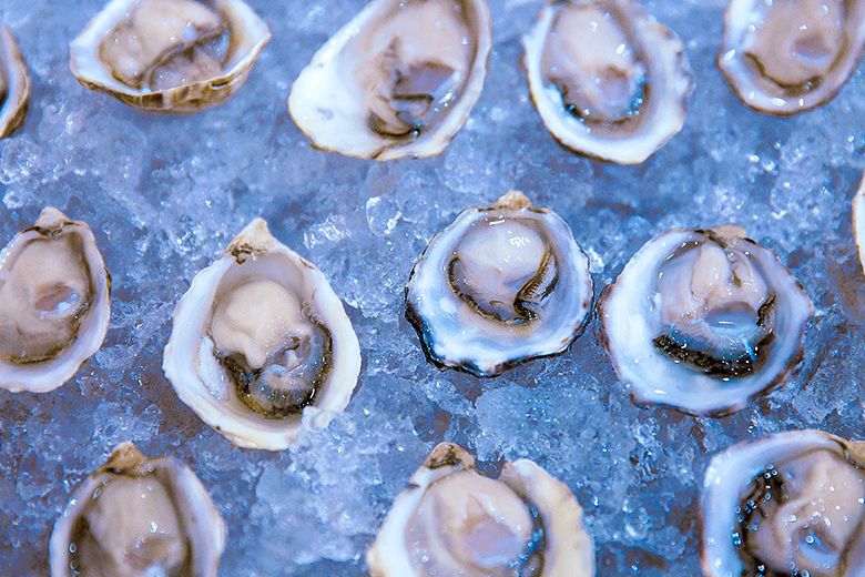Peerless oysters are a popular food at the JPR Annual Wine Tasting. ## Photo by Steven Addington Photography