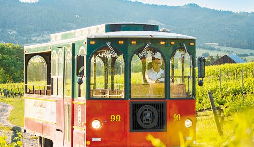 The Jacksonville Wine Trolley safely shuttles winery guests around the town and to nearby vineyards. ## Photo by Martina Patella