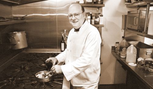 Jack Czarnecki prepares dinner for The Joel Palmer House guests during the winter of 1998. ##Photo by Sol Neeman/News-Register
