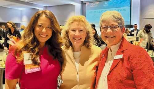 The Portland Business Journal’s Women of Influence Awards recently honored two Yamhill County residents. Jessica Mozeico, co-founder of Et Fille Wines (left), standing with former award recipent Eugenia Keegan of Jackson Family Wines (center) and Susan Sokol Blosser, co-founder of Sokol Blosser Winery, who received the Joan Austin Woman of Impact Award (right). ## Photo by Gabriella Mozeico