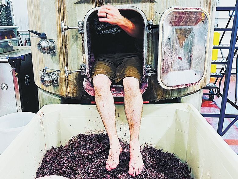 Sound & Vision Wine Co. s co-founder Joe Chepolis crawling out of a tank. ##Photo provided by Sound & Vision Wine Co. Sound & Vision Wine Co. s co-founder Joe Chepolis crawling out of a tank. ##Photo provided by Sound & Vision Wine Co.