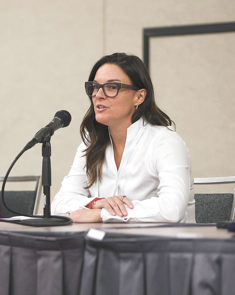 Jen Cossey, general manager of Amity&rsquo;s Brooks Wine, speaking on a panel during the Oregon Wine Symposium. ## Photo by Kelly Lyon