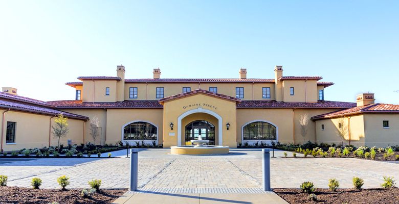The Clubhouse entrance features a fountain and extensive landscaping. ##Photo Courtesy of Domaine Serene