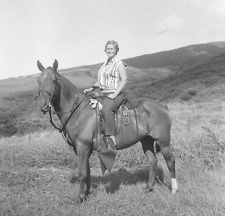 Joan “Kina” Marie Butler riding a horse in Hana Maui, Hawaii, 1959. ##Photo provided by Erik Erath