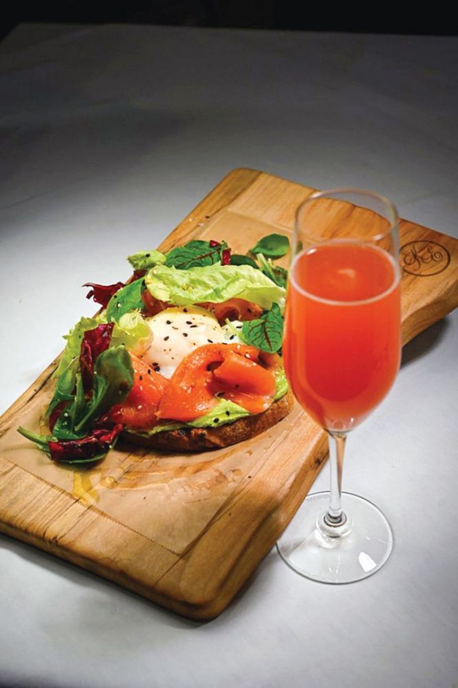 Smoked salmon toast at the King Estate Restaurant is paired with a blood orange mimosa made with King Estate’s sparkling wine.#Photo by Andy Nelson