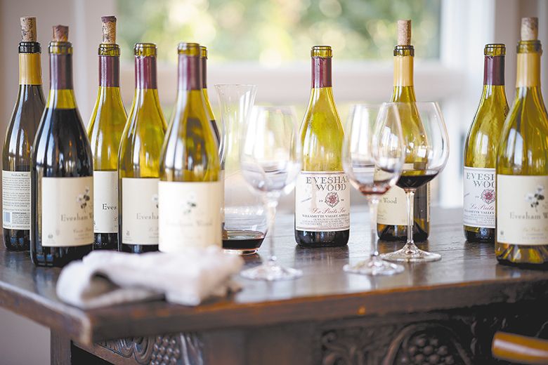Open bottles and wine glasses at the Evesham Wood 40th anniversary celebration. ## Photo by Alexander Fortson