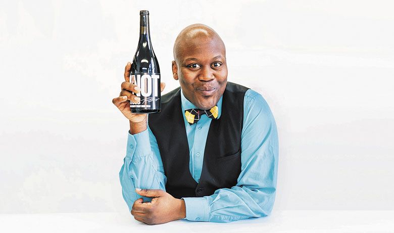 Burgess holds a bottle of his wine inspired by the song that became an Internet and meme sensation. ##Photo courtesy of Fine Wine Agency