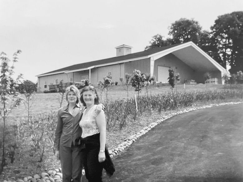 Left Coast Estate founder, Suzanne Larson, poses with longtime friend Anne Wilhelmsen Bertelsen in the winery’s early days.##Photo provided by Left Coast Estate