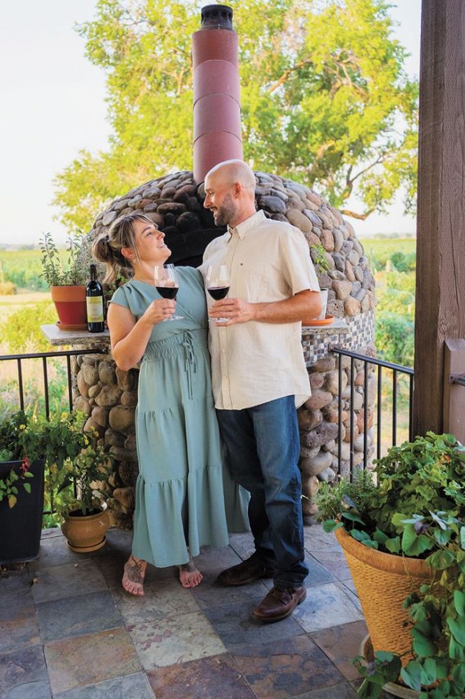 Windrow Estate Winery&rsquo;s Samantha Maiden drinking a glass of red wine with husband Andrew. ## Photo provided by Windrow Estate Winery