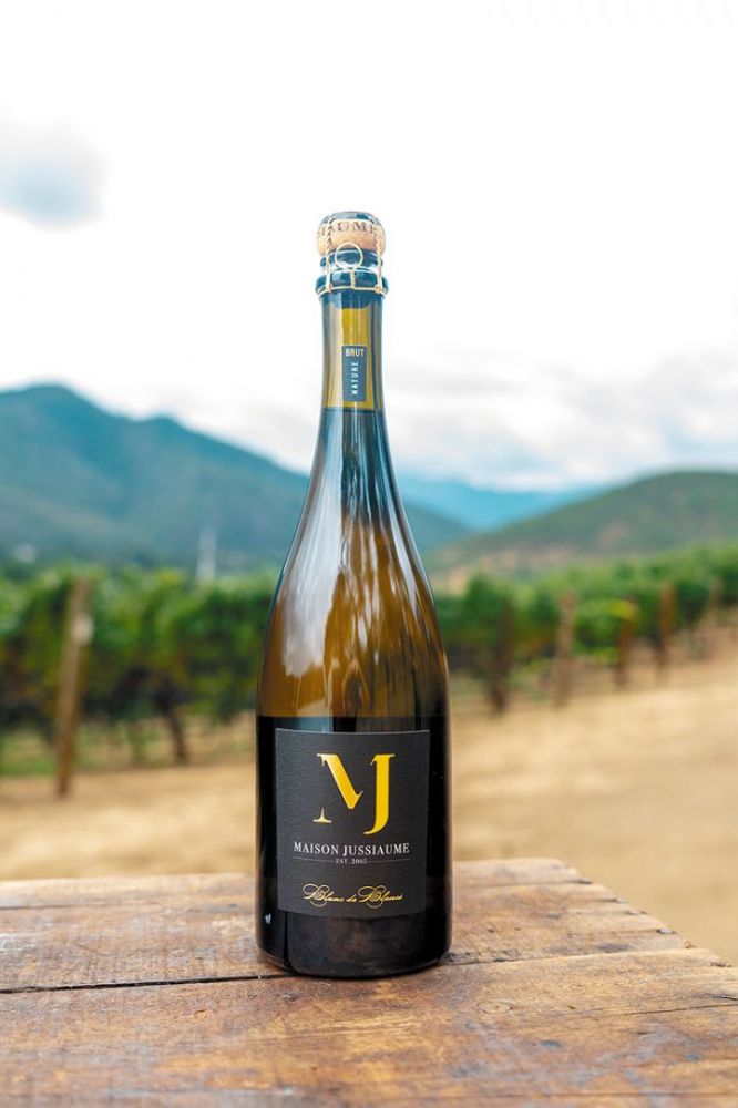 A bottle of Maison Jussiaume Blanc de Blancs sparkling wine. ## Photo provided by Maison Jussiaume