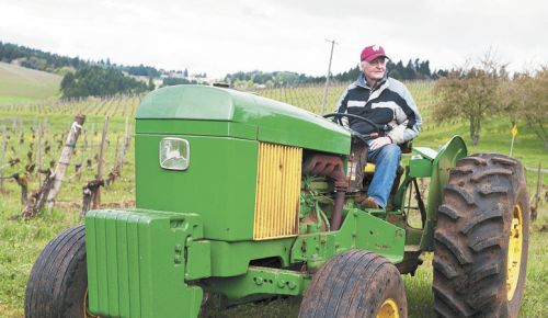 Jim Maresh on his tractor in the Dundee Hills. ##Photo by Del Munroe