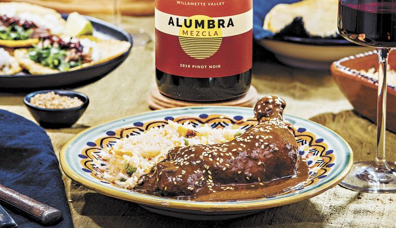 Molé Poblano paired with Alumbra Cellars 2019 Mezcla Pinot Noir. Recipe from Miguel Marquez, based on his abuela’s recipe served in Mexico City since 1961. ##Photo by Kathryn Elsesser