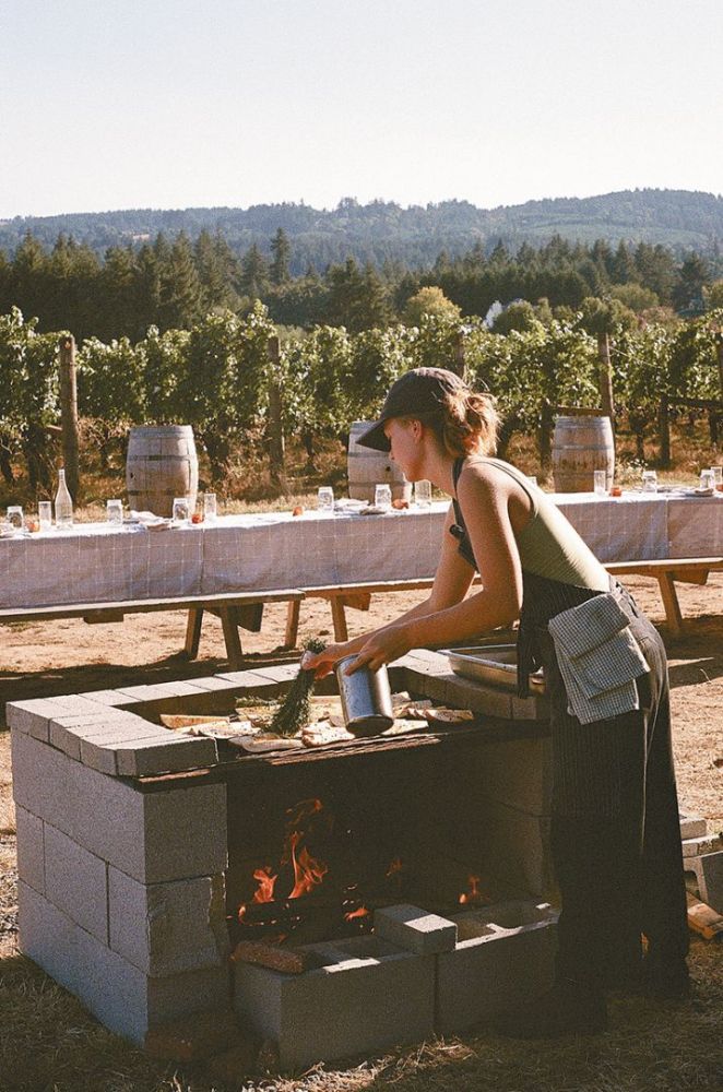 Mia Ponzi Hamacher cooking on an outdoor grill. ## Photo by Josh Chang