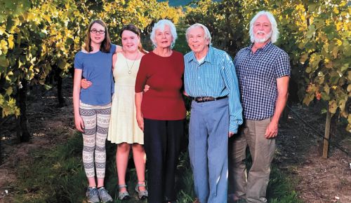 From left: Grandchildren Anya and Savonne stand with grandparents Traute and Don Moore and father Michael.##Photo provided From left: Grandchildren Anya and Savonne stand with grandparents Traute and Don Moore and father Michael.##Photo provided