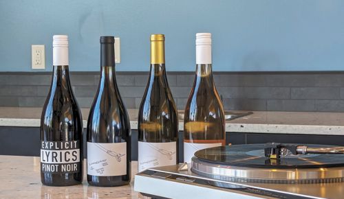 A visit to Longplay Wines includes listening to a curated selection of music albums on the record player.##Photo by Todd Hansen of Longplay Wines