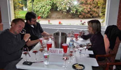 Thomas Houseman, winemaker for Anne Amie Vineyards, Herb Quady, winemaker for Quady North and Troon and Toni Ketrenos, wine buyer for Portland-area New Seasons Markets, evaluate the wines at the 2010 NorthWest Wine Summit.