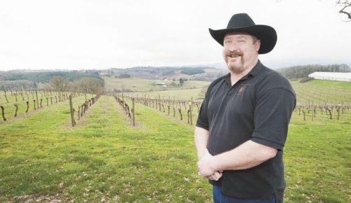 Dave Masciorini stands among the vines at Namasté Vineyard in Dallas.
