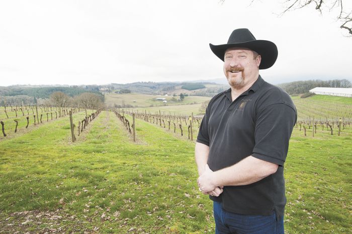 Dave Masciorini stands among the vines at Namasté Vineyard in Dallas.