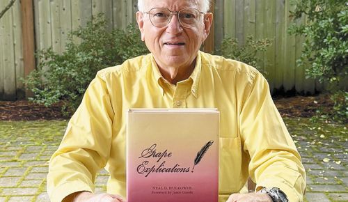 Writer and author Neal D. Hulkower holding his book &ldquo;More Grape Explications.&rdquo; ## Photo by Neal D. Hulkower