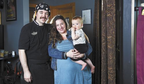 The Newbergundian’s Sean and Noelle McKee with their toddler, Eleanora Louise. ##Photo by Rusty Rae