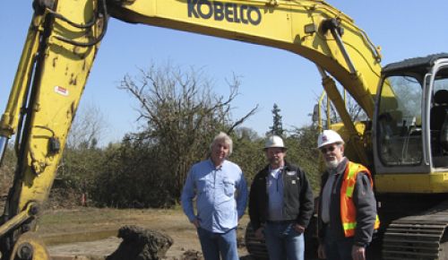 Laurent Montalieu, of NW Wine Company; Matt Pihl, of Pihl, Inc.; and Dave Wheeler, of Perlo Construction, join forces at the NW groundbreaking.  Photo provided.