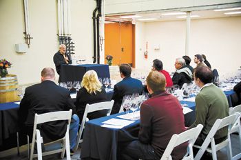 David Adelsheim speaks at the 40th anniversary library tasting.  Photo courtesy of Adelsheim Vineyard.