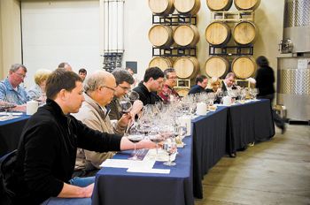 Guests compare six flights from Adelsheim vintages
1981, 1989, 1992, 1999, 2005 and 2009. Photo courtesy of Adelsheim Vineyard. Guests compare six flights from Adelsheim vintages
1981, 1989, 1992, 1999, 2005 and 2009. Photo courtesy of Adelsheim Vineyard.