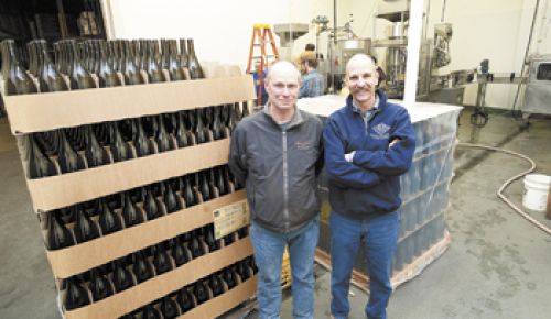 Allen Holstein, vineyard manager, and Rollin Soles, general manager/head winemaker, in the Argyle Winery bottling room. They’ve overseen operations since it opened a quarter century ago.