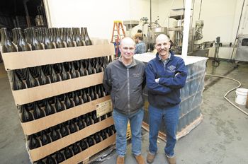 Allen Holstein, vineyard manager, and Rollin Soles, general manager/head winemaker, in the Argyle Winery bottling room. They’ve overseen operations since it opened a quarter century ago.