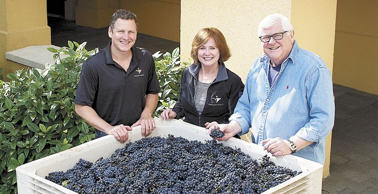 Domaine Serene winemaker Erik Kramer (left) with owners Ken and Grace Evenstad at the Dayton winery. ##Photo provided