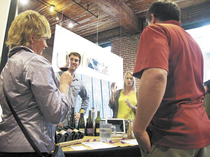 Peter Cushman, son of Viento winemaker Rich Cushman, and his wife, Sarah, talk with guests at the recent Columbia Gorge event hosted at Cerulean Skies Winery’s urban tasting room.