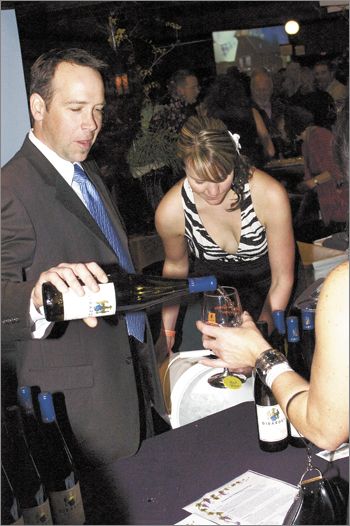 Second-generation winemaker Marc Girardet pours one of his latest Umpqua Valley releases at the 2012 Greatest of the Grape.