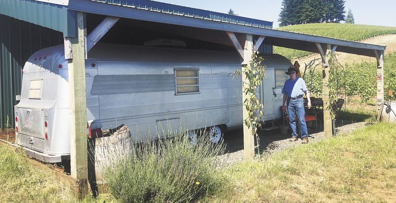 A vintage Silver Streak trailer doubles as an eclectic employee lounge at the Hollorans’ Le Pavillon Vineyard, not far from the new facility. ##Photo by Neil Zawicki