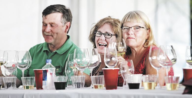 Friends attend the Riedel seminar, a part of the celebration’s Oregon Wine University. ##Photo by Steven Addington Photography